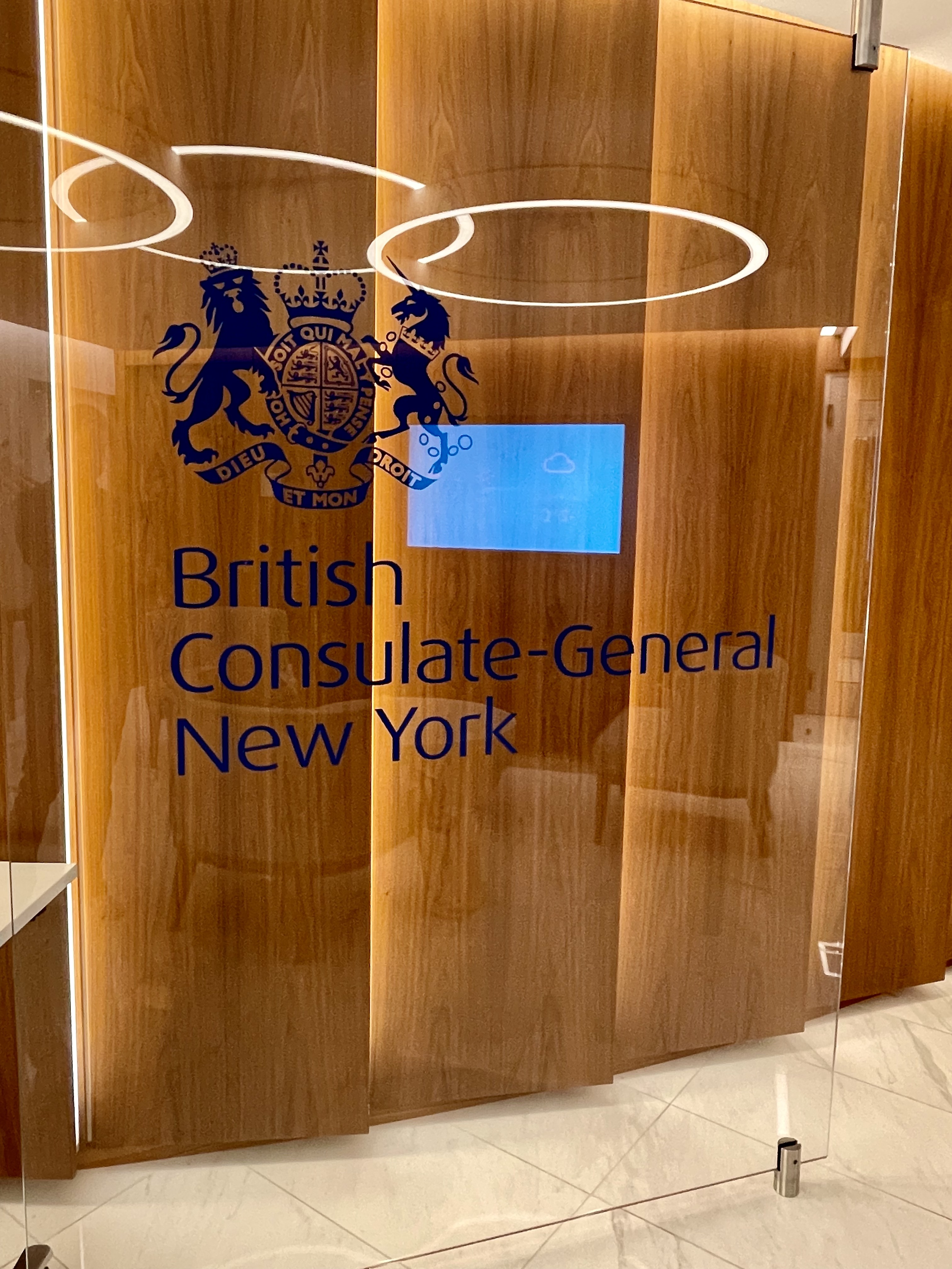 Glass doors display a royal crest and British Consulate-General New York text